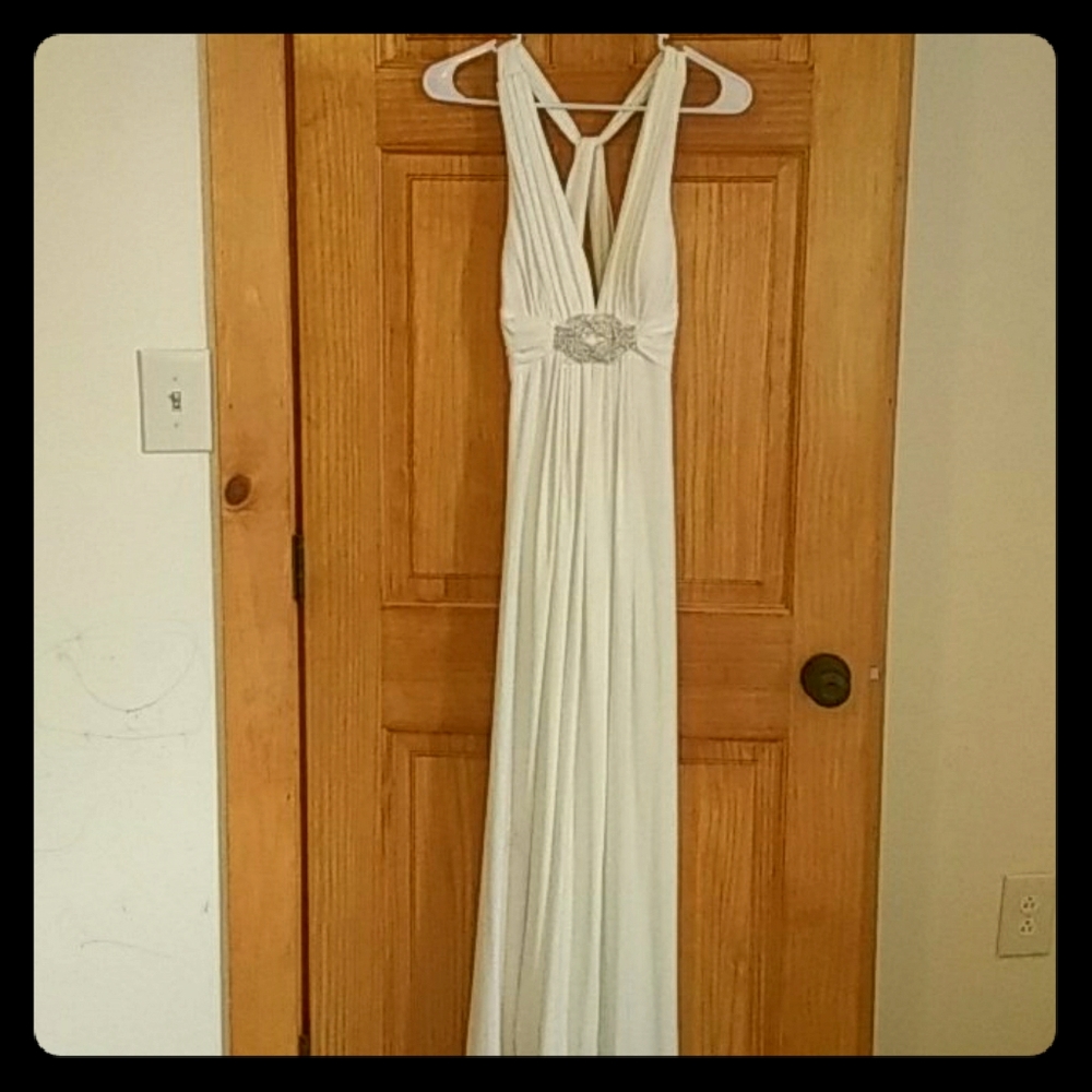 Almost backless, plunging white reception dress